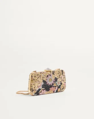 Carry Secrets Minaudiere med rhinestones og Apres L’Hiver-motiv