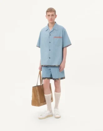 Denim-bermudashorts med blomstertrykk i kanten