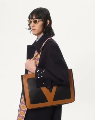 Enkeltradet kåpe i ull og kashmir