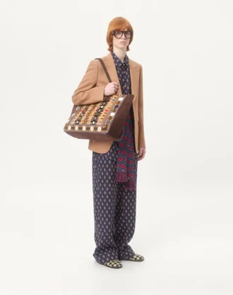 Lette linbukser med mansjetter og Voyage Imaginaire-trykk