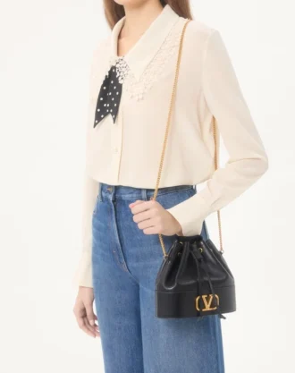 Mini-veske i nappa med Vlogo-signaturkjede