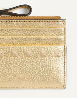 Rockstud laminert kortetui i kornet kalveskinn med glidelås