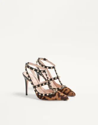 Rockstud-pumps med stropper i kalveskinn med ponieffekt 100 mm