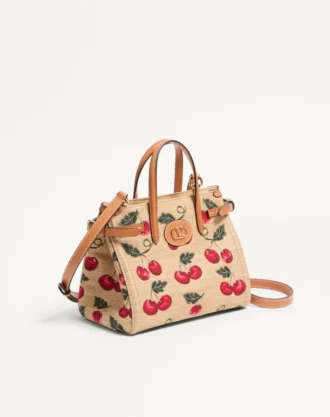 Valentino Garavani Antibes liten handlepose i jacquard raffia med Cherryfic-mønster