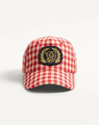 Valentino Garavani baseballcap i bomull og ull med patch