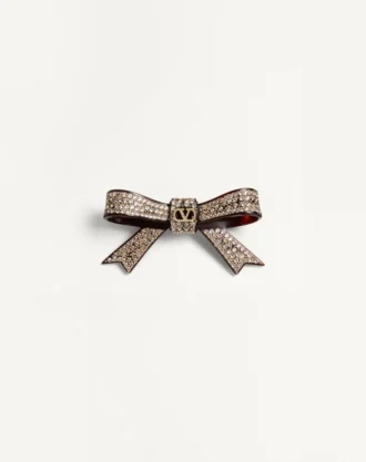 Vlogo Signature hårspenne i harpiks, metall og krystaller